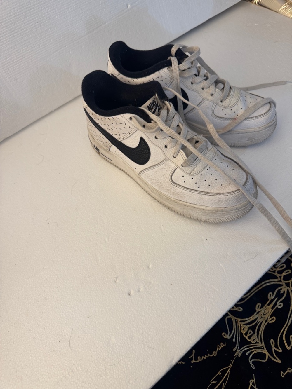 Nike White and Black Mid-Top Sneakers with Black Swoosh
